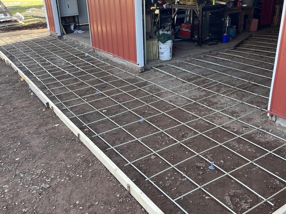 concrete gatorbar apron outside a shop 